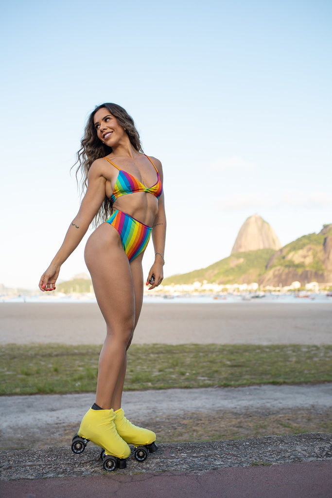 The 70's are back! The Vintage Caraiva bikini combines hot pants design with ribbed rainbow stripes . Retro style hot pants matched with a padded top.